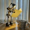 RRobot shaped ambient light cyberpunk desktop light-Steampunk Lamp, Robot Desk Lamp, Industrial Table Lamp, Retro Robot Light, Vintage Pipe Lamp, Steampunk Decor, Edison Bulb Lamp, Robot Home Decor, Mechanical Lamp, Steampunk Gift Idea, Handmade Robot Lamp, Industrial Home Lighting, Metal Robot Lamp, Rustic Desk Light, Unique Desk Lamp-nic-decoe-nic-home-woleseller-bd-nicdecor-nichomedecor-best-gift-Bd-Price