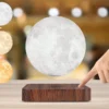 levitating moon lamp, floating night light, magnetic moon lamp, 3D printed moon, lunar decor lamp, moon light gift, space themed night light, ambient moonlight, moon table lamp, levitating LED lamp
