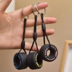 tyre keychain, car tire key ring, bike lover gift, auto accessory keyring, rubber wheel keychain, mini tyre key holder, keychain for drivers, car themed gift, motorcycle key ring, cool keychains for men-nic-home-decor, wholesale-bd, best-price-bd, best-products-in-bd, gifts-and-unique, nic-wall-e-tissue-holder, unique-home-decor-bd, robot-tissue-box-bd, disney-merchandise-bangladesh, quirky-gift-ideas-bd