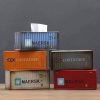 shipping container tissue box, metal tissue holder, industrial style decor, quirky home accessories, cargo container design, novelty tissue box, tissue holder for office, cool tissue dispenser, gift for truckers, home decor Bangladesh-nic-home-decor, wholesale-bd, best-price-bd, best-products-in-bd, gifts-and-unique, nic-wall-e-tissue-holder, unique-home-decor-bd, robot-tissue-box-bd, disney-merchandise-bangladesh, quirky-gift-ideas-bd