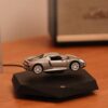 floating car display, magnetic levitation car, desktop car model, levitating car ornament, car enthusiast gift, spinning car display, collectible car decor, black base levitation stand, futuristic display piece, tech desktop ornament-nic-home-decor, wholesale-bd, best-price-bd, best-products-in-bd, gifts-and-unique, nic-wall-e-tissue-holder, unique-home-decor-bd, robot-tissue-box-bd, disney-merchandise-bangladesh, quirky-gift-ideas-bd