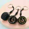 tyre keychain, car tire key ring, bike lover gift, auto accessory keyring, rubber wheel keychain, mini tyre key holder, keychain for drivers, car themed gift, motorcycle key ring, cool keychains for men-nic-home-decor, wholesale-bd, best-price-bd, best-products-in-bd, gifts-and-unique, nic-wall-e-tissue-holder, unique-home-decor-bd, robot-tissue-box-bd, disney-merchandise-bangladesh, quirky-gift-ideas-bd