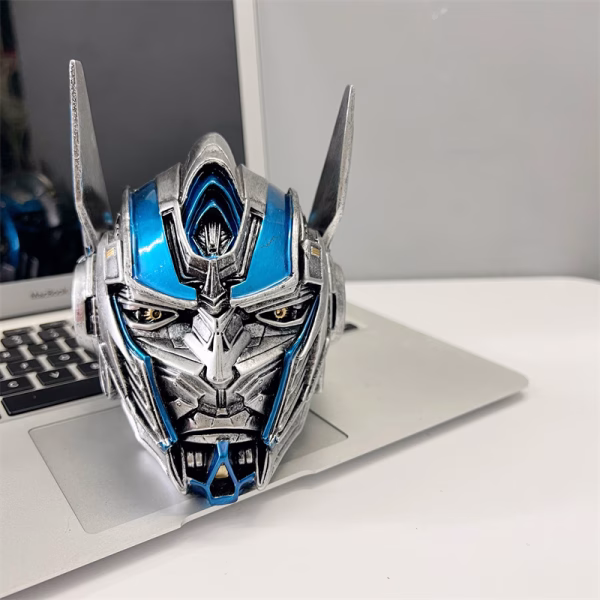 transforming optimus ashtray, robot model ashtray, windproof ashtray with lid, sci-fi desk decor, cool ashtray toy, optimus prime ashtray, home office ashtray, resin ashtray bd, unique gift for smokers, wholesale ashtray bangladesh