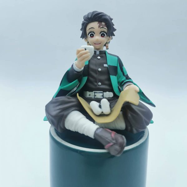 Tanjirou figure anime slayer eating rice balls sitting pose character action figure ghost slayer desk 3