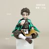 anime figure, tanjirou kamado, demon slayer merch, anime desk decor, sitting pose figure, onigiri anime figure, collectible action figure, pvc anime statue, nichomedecor, nicdecor.com