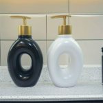Black and white ceramic donut shaped soap dispensers 1