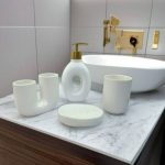 White ceramic bathroom accessory set