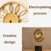 golden sunflower clock, modern table clock, minimalist desk clock, floral tabletop decor, quiet quartz clock, home office accessory, creative flower clock, nicdecor.com, nichomedecor
