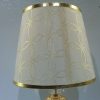 Metal body with acrylic design & brown fabric shade table lamp 1
