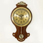 Classic Wooden Pendulum Wall Clock with Golden Dial and Metal Accents
