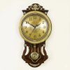 Golden Dial Pendulum Wall Clock – Wooden Body